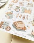 Premium Handmade Sticker Sheet
Aesthetic Cozy 105mm x 148mm - a sheet on the table with an opened notebook