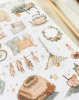 Premium Handmade Sticker Sheet
Aesthetic Cozy 105mm x 148mm - a sheet on the table with a pencil, an opened notebook