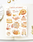 Premium Handmade Sticker Sheet Autumn in my Heart 105mm x 148mm - a sheet on the table with a white flower branch, an opened notebook