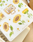 Premium Handmade Sticker Sheet Chamomile Sunflower 105mm x 148mm - a sheet on the table