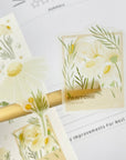 Premium Handmade Sticker Sheet Chamomile Sunflower 105mm x 148mm - 2 pieces on the stick and a sheet on the table
