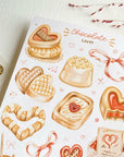 Premium Handmade Sticker Sheet
Chocolate Lover 105mm x 148mm - a sheet on the table with a dark maroon flower branch