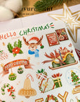 Premium Handmade Sticker Sheet Christmas 105mm x 148mm - a sheet on the table with a white flower branch, an opened notebook, 2 stars