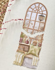 Premium Handmade Sticker Sheet Cozy Corner 105mm x 148mm - 2 pieces on the table with a pink flower branch