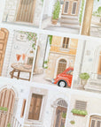 Premium Handmade Sticker Sheet Cozy Doors 105mm x 148mm - a sheet on the table