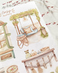 Premium Handmade Sticker Sheet Cozy Scenery 105mm x 148mm - 4 pieces on the table with dark maroon flower branch