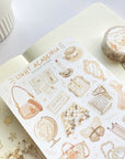 Premium Handmade Sticker Sheet Dark & Light Academia 105mm x 148mm - a washi tape and a sheet on the table with an opened notebook, a white flower branch
