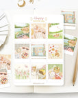 Premium Handmade Sticker Sheet Happy Summer Day 105mm x 148mm - 4 pieces and a sheet on the table with a pencil, an opened notebook