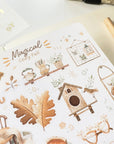 Premium Handmade Sticker Sheet Magical Cozy Fall 105mm x 148mm - a sheet on the table with a pencil