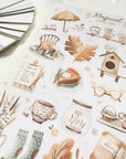 Premium Handmade Sticker Sheet Magical Cozy Fall 105mm x 148mm - a sheet on the table