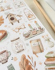 Premium Handmade Sticker Sheet Magical Cozy Fall 105mm x 148mm - a sheet on the table with a pencil