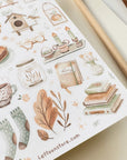 Premium Handmade Sticker Sheet Magical Cozy Fall 105mm x 148mm - a sheet on the table with a pencil