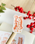 Premium Handmade Sticker Sheet Present Time 105mm x 148mm - a piece on stick and a sheet on the table with a red berry branch, an opened notebook