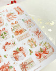Premium Handmade Sticker Sheet Present Time 105mm x 148mm - a sheet on the table with a red berry branch