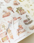 Premium Handmade Sticker Sheet Reading at Home 105mm x 148mm - a sheet on the table