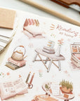 Premium Handmade Sticker Sheet Reading at Home 105mm x 148mm - a sheet on the table with a pencil