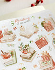 Premium Handmade Sticker Sheet
Reading in the Winter 105mm x 148mm - a sheet on the table with a red berry branch