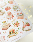 Premium Handmade Sticker Sheet
Reading in the Winter 105mm x 148mm - a sheet on the table