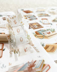 Premium Handmade Sticker Sheet Reading Time 105mm x 148mm - a piece and 2 sheets on the table with an opened notebook