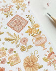 Premium Handmade Sticker Sheet Romantic Flower 105mm x 148mm - a sheet on the table with a pink flower branch and a pencil
