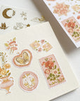 Premium Handmade Sticker Sheet Romantic Flower 105mm x 148mm - 6 pieces and a piece and a sheet on the table
