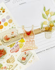 Premium Handmade Sticker Sheet Summer Breeze 105mm x 148mm - 3 pieces on the stick and a sheet on the table