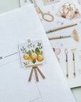Premium Handmade Sticker Sheet The Art of Summer 105mm x 148mm - a piece and a sheet on the table