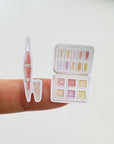 Premium Handmade Sticker Sheet The Art of Summer 105mm x 148mm - 2 pieces on the finger
