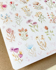 Premium Handmade Sticker Sheet Wild Flower 105mm x 148mm - a sheet on the table