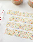 Premium Handmade Washi Tape Blooming Flower 15mm x 10m - 4 pieces and 2 washi tapes on the table with a dark maroon branch