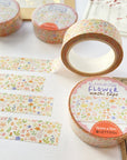 Premium Handmade Washi Tape Blooming Flower 15mm x 10m - 4 pieces and 4 washi tapes on the table with a dark maroon branch, a sticker sheet, a chapter heading