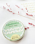 Premium Handmade Washi Tape Chamomile 5mm x 10m - 5 pieces and a washi tape on the table with a dark maroon flower branch