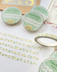 Premium Handmade Washi Tape Chamomile 5mm x 10m - 5 pieces and 6 washi tapes on the table with a dark maroon flower branch, a sticker sheet, a chapter heading
