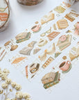Premium Handmade Washi Tape Day & Night Reading 15mm x 10m - 4 pieces and 2 washi tapes on the table with a white flower branch