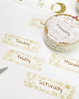 Premium Handmade Washi Tape Days of The Week 15mm x 10m - 6 pieces and 2 washi tapes on the table with a pink flower branch, a heading chapter, a sticker sheet