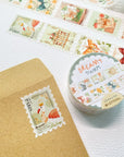 Premium Handmade Washi Tape Dreamy Stamp 25mm x 5m - 2 pieces and a washi tape on the table with a branch, an envelope, a notebook