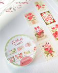 Premium Handmade Washi Tape Floral Stamps 25mm x 5m - 2 pieces and a washi tape on the table with a pink flower branch