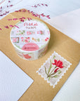 Premium Handmade Washi Tape Floral Stamps 25mm x 5m - a piece and a washi tape on the table with a pink flower branch, a envelope