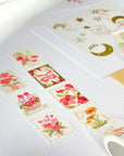 Premium Handmade Washi Tape Floral Stamps 25mm x 5m - 2 pieces and a washi tape on the table with a sticker sheet