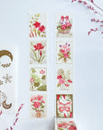 Premium Handmade Washi Tape Floral Stamps 25mm x 5m - 2 pieces on the table with 2 pink flower branches, a sticker sheet