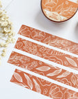 Premium Handmade Washi Tape Flower Pattern 15mm x 10m - 4 pieces and 2 washi tapes on the table with a white flower branch