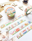 Premium Handmade Washi Tape Hallo Holland 15mm x 10m - 4 pieces and 3 washi tapes on the table with a white hydrangea flower branch, 2 wood stars, a wood heart, a wood gift, a round sedge weave, an acorn