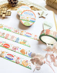 Premium Handmade Washi Tape Hallo Holland 15mm x 10m - 4 pieces and 3 washi tapes on the table with a white hydrangea flower branch, 2 wood stars, a wood heart, a wood gift, a round sedge weave, an acorn
