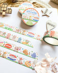 Premium Handmade Washi Tape Hallo Holland 15mm x 10m - 4 pieces and 3 washi tapes on the table with a white hydrangea flower branch, 2 wood stars, a wood heart, a wood gift, a round sedge weave, an acorn
