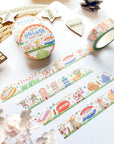 Premium Handmade Washi Tape Hallo Holland 15mm x 10m - 4 pieces and 3 washi tapes on the table with a white hydrangea flower branch, 2 wood stars, a wood heart, a wood gift, a round sedge weave, an acorn