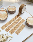Premium Handmade Washi Tape Light Flower Pattern 15mm x 10m - 4 pieces and 5 washi tapes on the table with 2 white flower branches, a notebook, a cup of tea