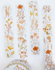 Premium Handmade Washi Tape Mellow Flower 15mm x 10m - 4 pieces and 2 washi tapes on the table