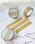 Premium Handmade Washi Tape Olive Green Grid 15mm x 10m - 3 pieces and 4 washi tapes on the table with 2 dark maroon flower branches, a chapter heading, a sticker sheet