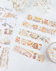 Premium Handmade Washi Tape Reading Time 15mm x 10m - 2 washi tapes and 2 sticker sheets on the table with a flower branch