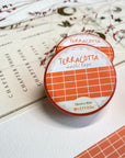 Premium Handmade Washi Tape Terracotta 15mm x 10m - a piece and 2 washi tapes on the table with a pink flower branch, a heading chapter